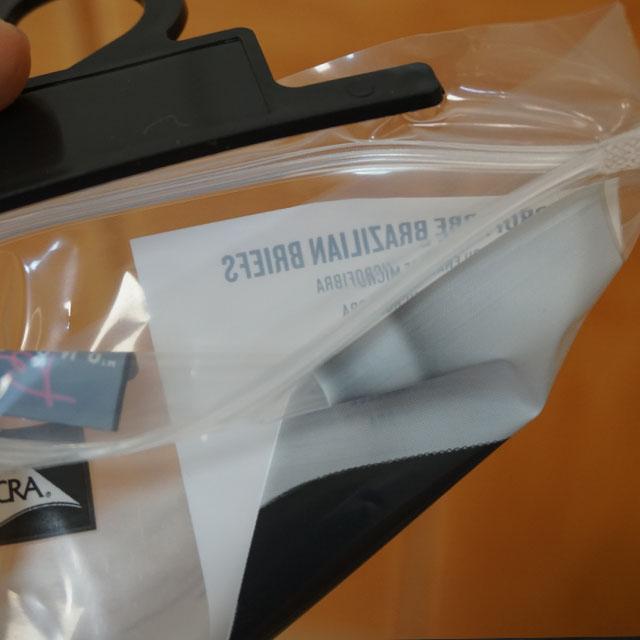 bolsos de empaquetado transparentes materiales del HDPE biodegradable barato k del precio de la fábrica de China para la ropa con la suspensión