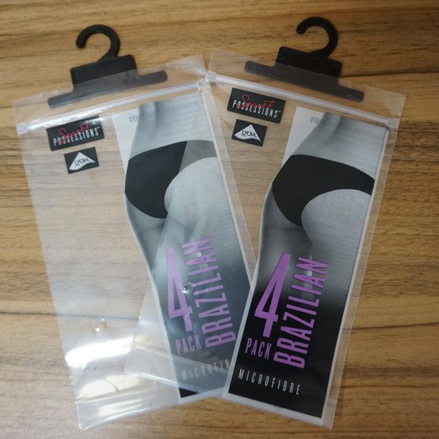 bolsos de empaquetado transparentes materiales del HDPE biodegradable barato k del precio de la fábrica de China para la ropa con la suspensión