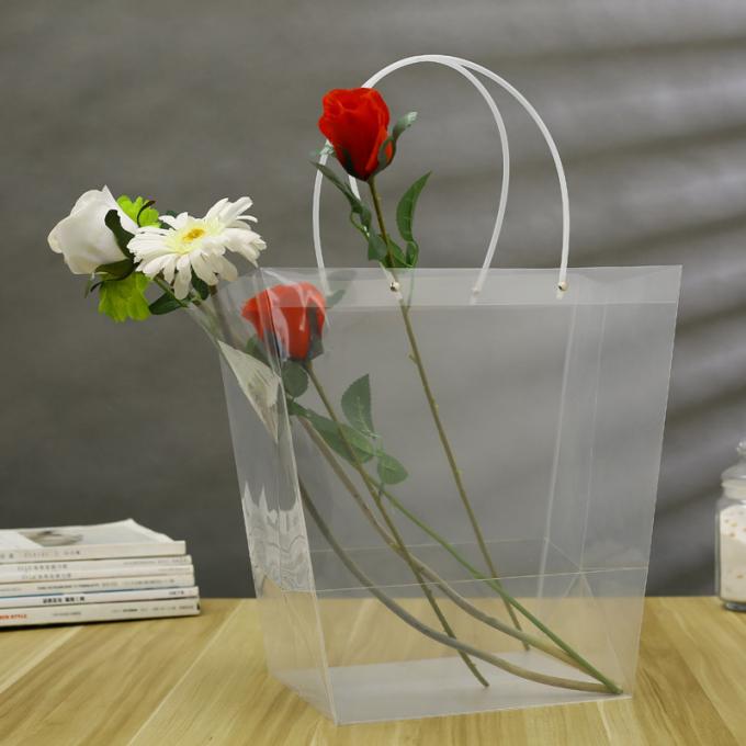 La floristería PP transparentes empaqueta el empaquetado en conserva del regalo de la fruta de la parte inferior que cuece de la bolsa de asas de gran tamaño ancha cuadrada de la torta