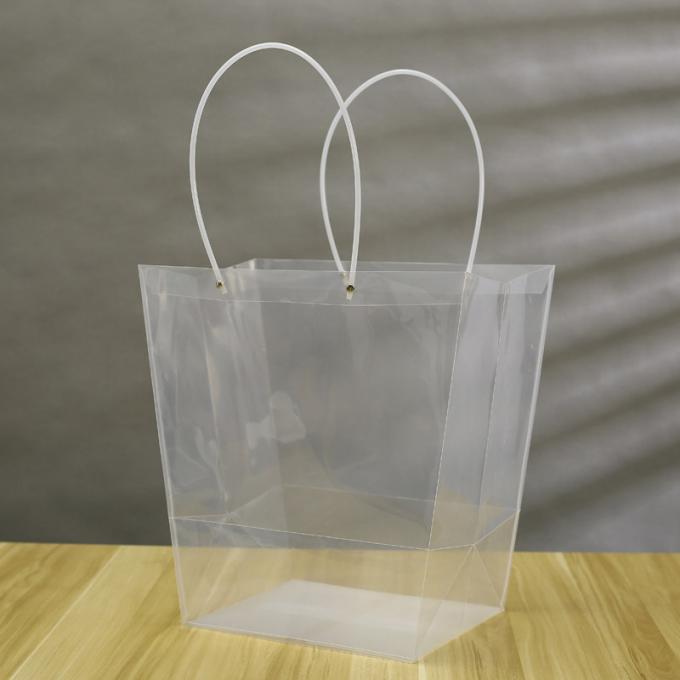 La floristería PP transparentes empaqueta el empaquetado en conserva del regalo de la fruta de la parte inferior que cuece de la bolsa de asas de gran tamaño ancha cuadrada de la torta
